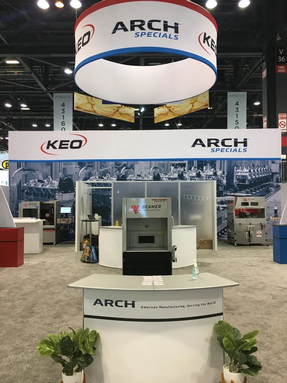 Arch Specials exhibit seen head on with KEO and Arch signage