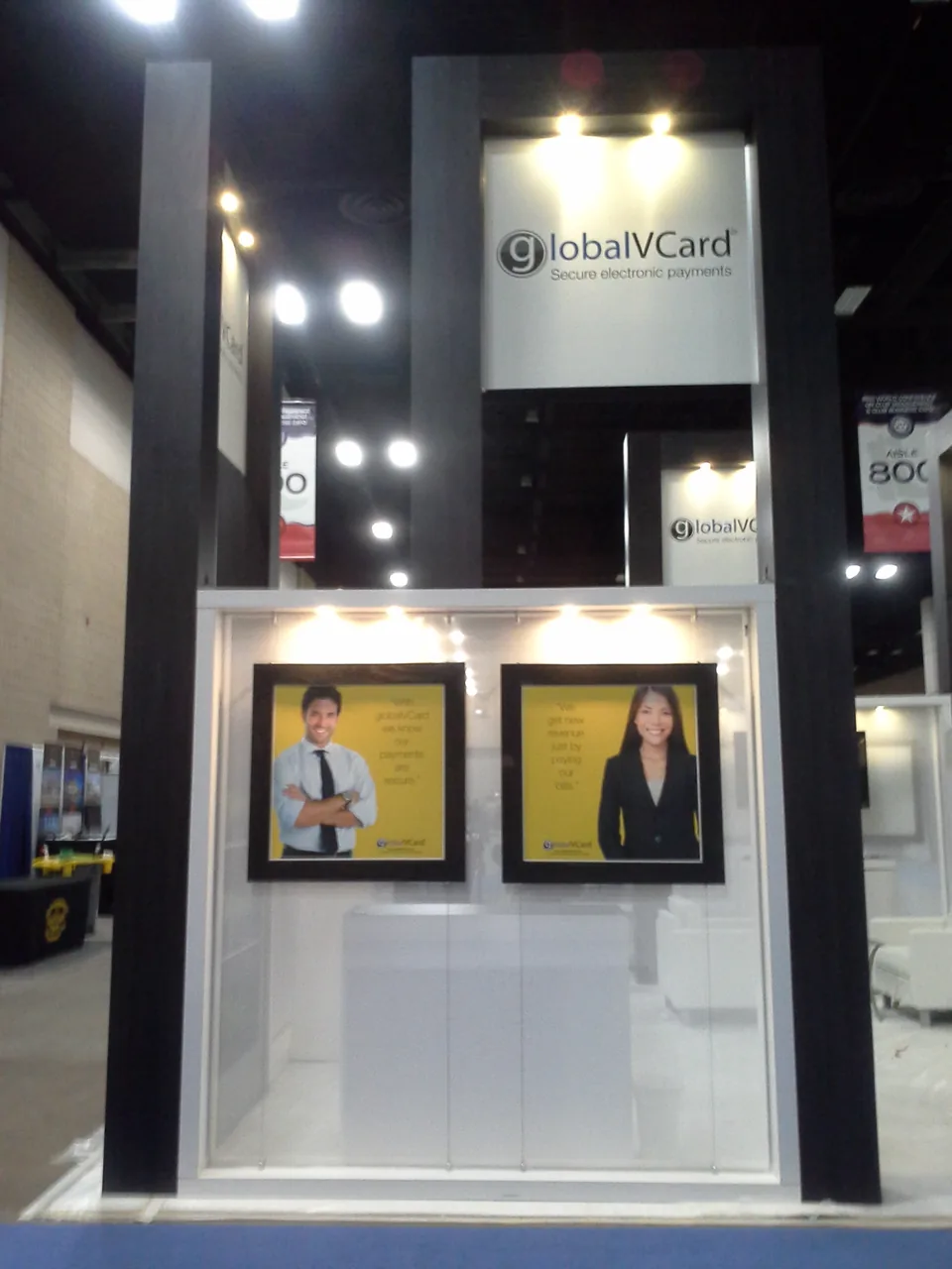 GlobalVCard exhibit detail with mounted display between two towers