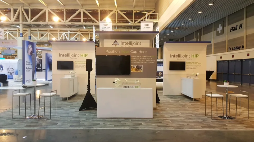 Intellijoint HIP exhibit with three display stations