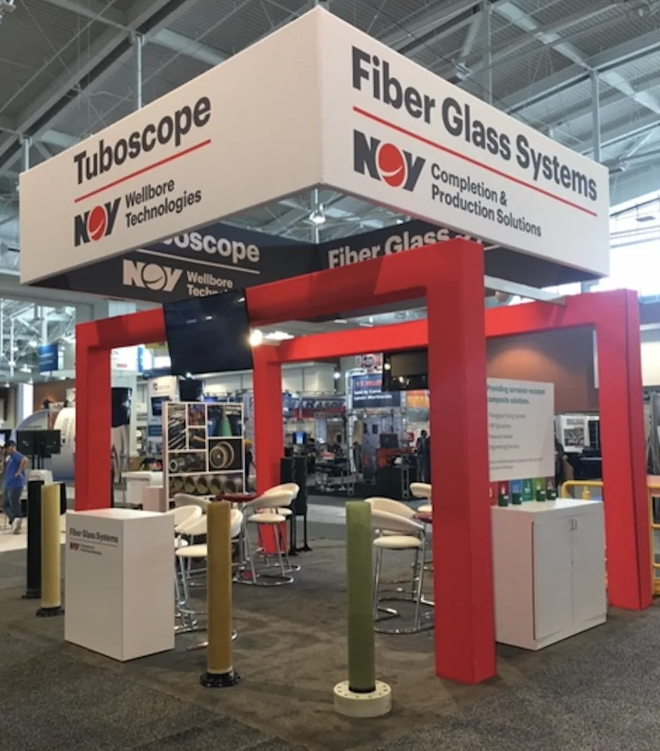 NOV Tuboscope exhibit with red columns and white canopy